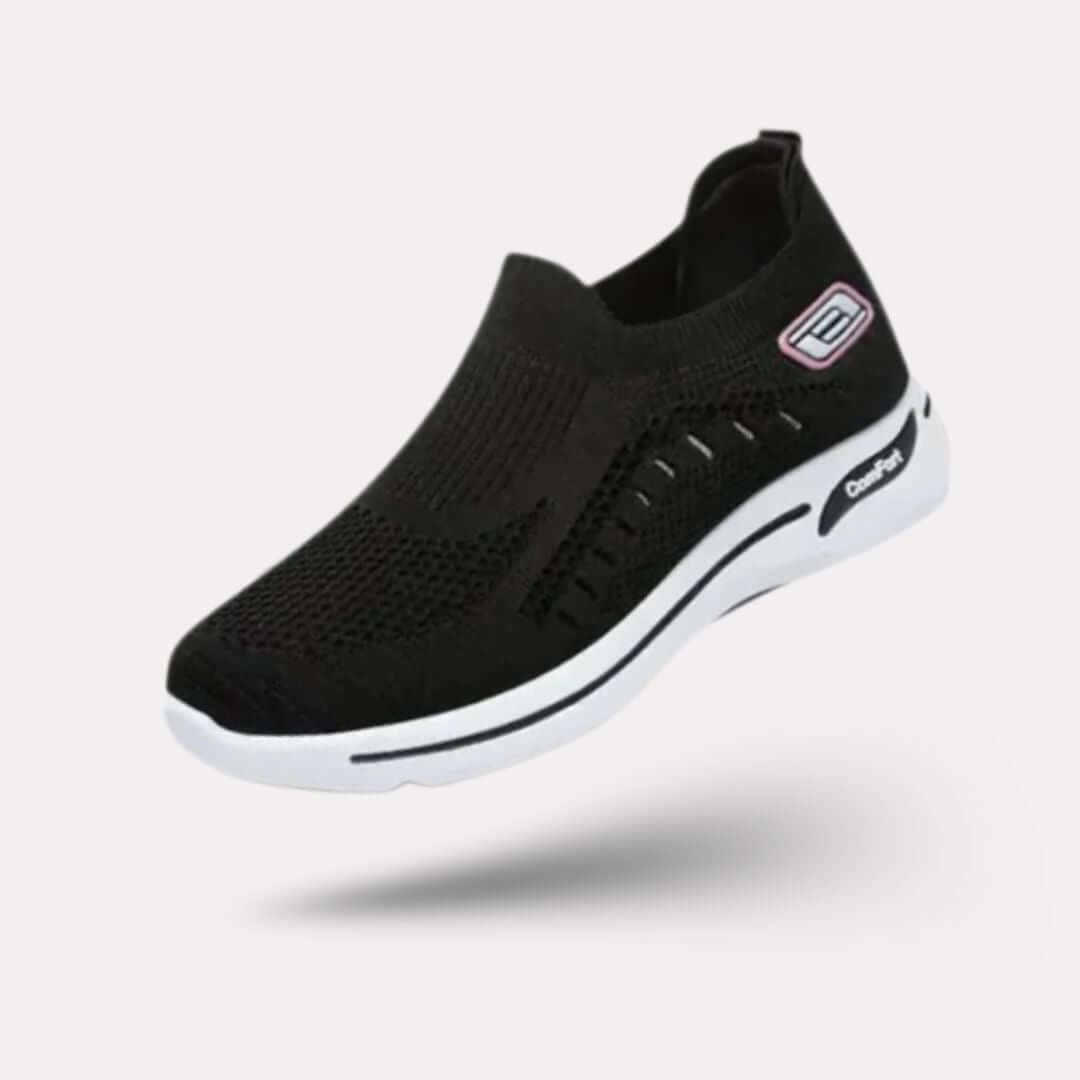 "Baskets orthopédiques pour femme en gris foncé, style moderne et semelles confortables, vue latérale élégante."