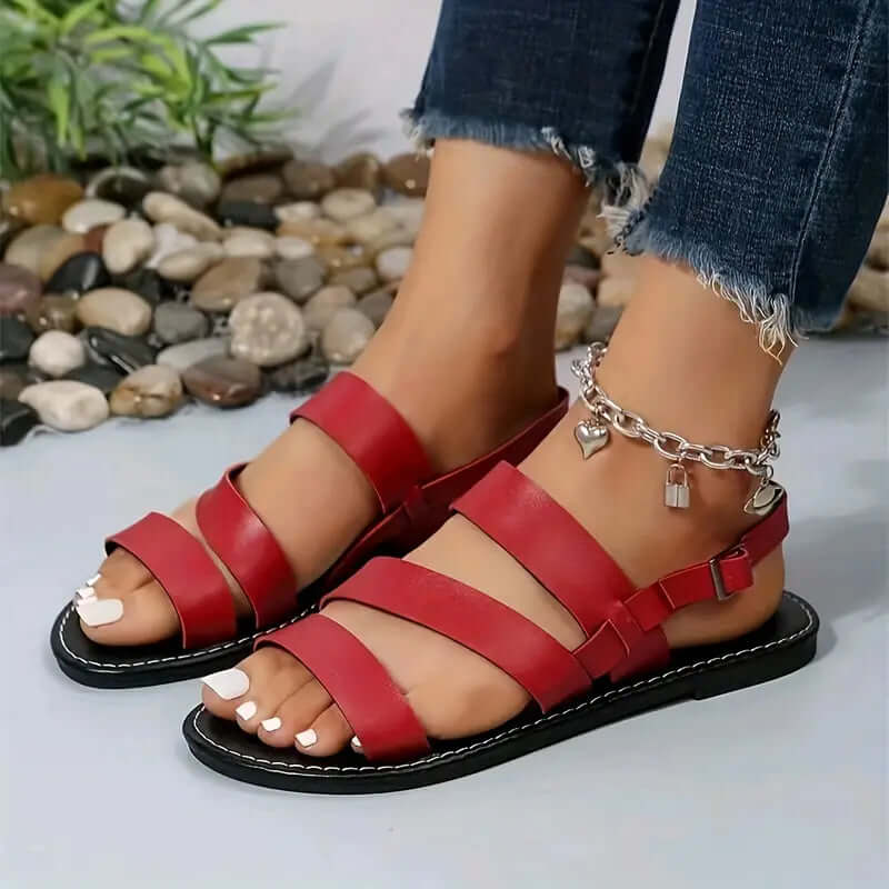 "Sandales romaines pour femmes en cuir, brides à la cheville, élégance estivale, confort et design moderne."