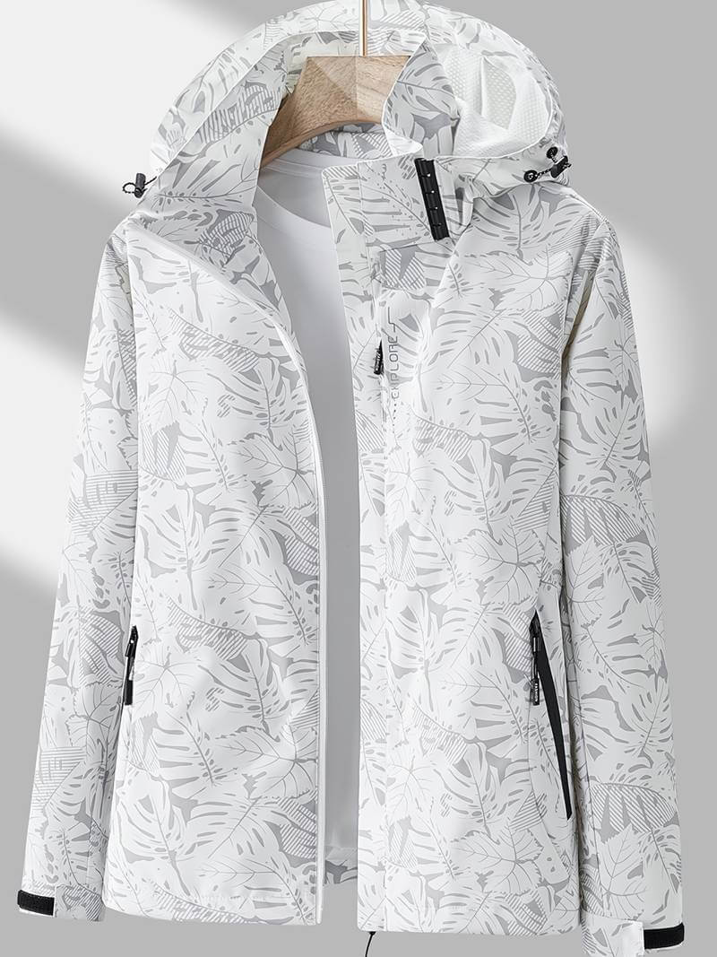 Veste imperméable femme, capuche ajustable, légère, moderne, coloris neutre, idéale pour activités extérieures et urbaines.