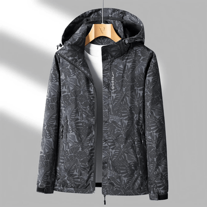 "Veste imperméable Opaline pour femme, légère et coupe-vent, avec capuche intégrée et design moderne."