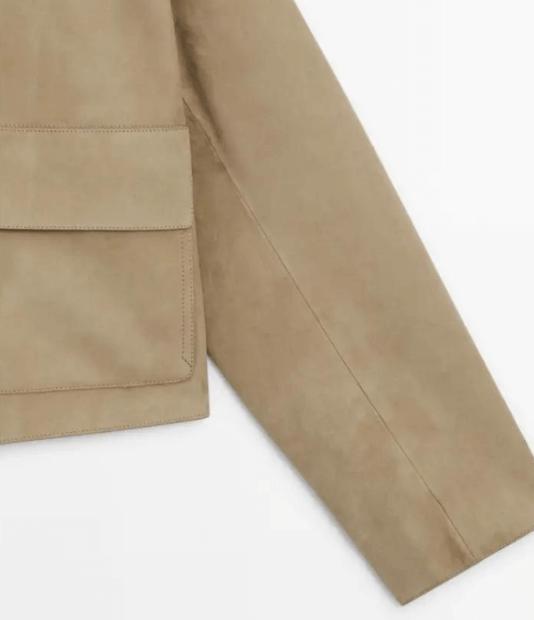 "Veste en cuir femme Karly, coupe ajustée, design moderne, cuir souple, couleur neutre, accentue la silhouette élégante."