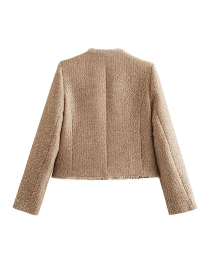 "Veste Élégante Femme Élise, design chic et polyvalent, parfaite pour un look casual ou formel, en tissu polyester."