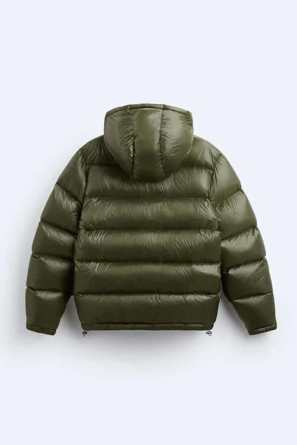 "Veste Puffer imperméable noire, rembourrage isolant, coupe décontractée, parfaite pour activités extérieures sous la pluie."