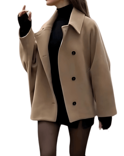 "Manteau en laine oversize brun, coupe ample, détails boutons, chic pour automne hiver, style et confort assuré."