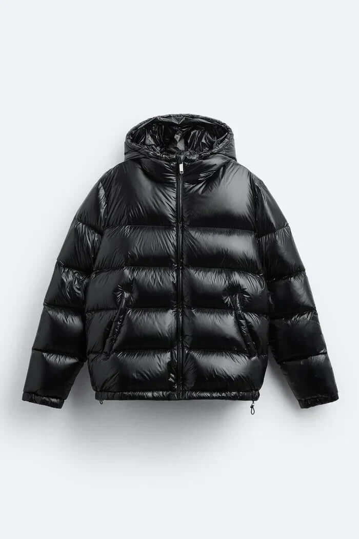 "Veste Puffer imperméable noire, rembourrage isolant, coupe décontractée, parfaite pour activités extérieures sous la pluie."