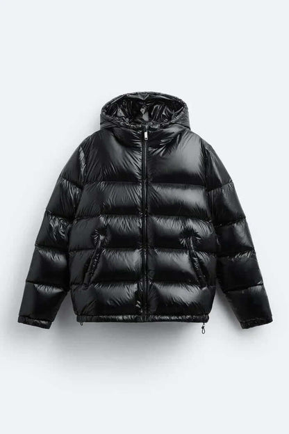 "Veste Puffer imperméable noire, rembourrage isolant, coupe décontractée, parfaite pour activités extérieures sous la pluie."