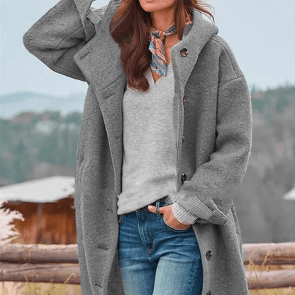 "Veste épaisse pour femmes, vue de face, coupe moderne, tissu tweed gris, élégante et chaude, idéale pour l'hiver."