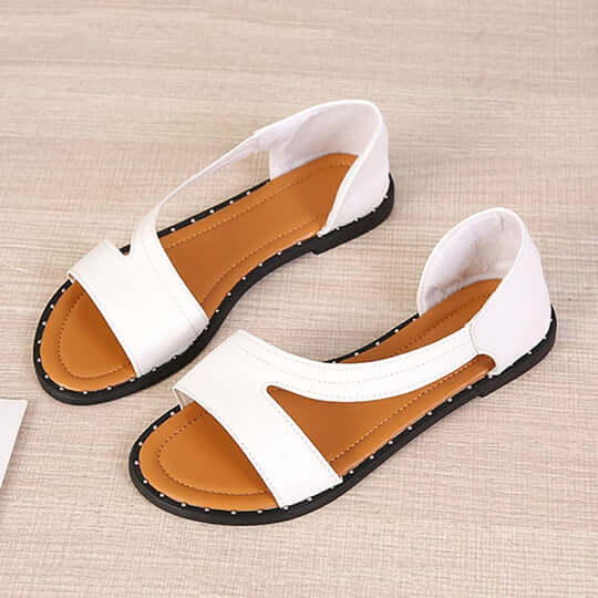 "Sandales orthopédiques de luxe pour femmes, cuir blanc et noir, design élégant et soutien confortable pour tous les jours."