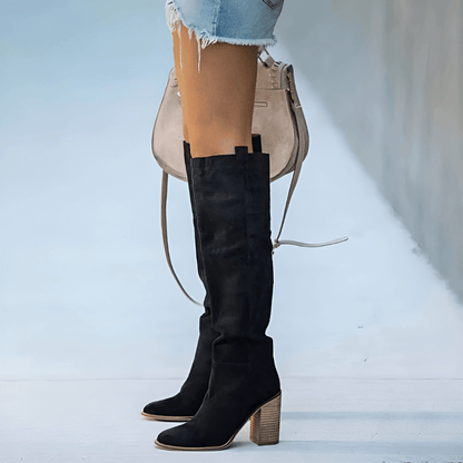 "Bottes en cuir pour femmes au design classique, talon stable, parfaites pour un style élégant et confortable au quotidien."
