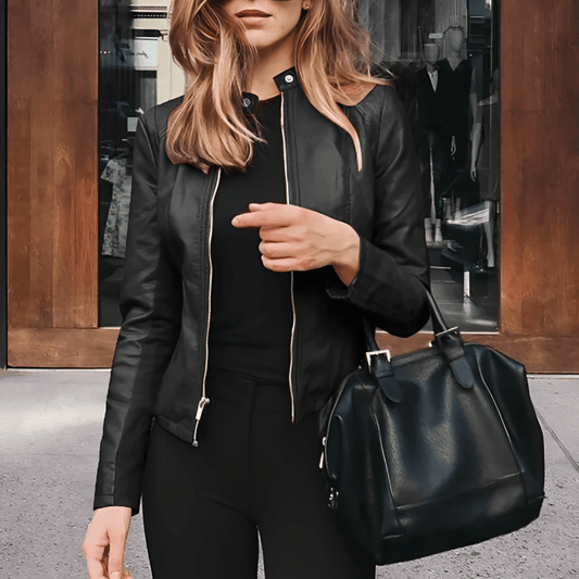 "Veste en cuir élégante pour femme, noire, moderne et polyvalente, avec finitions écologiques, parfaite pour toute occasion."