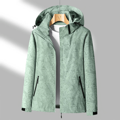 "Veste imperméable Opaline pour femme, légère et coupe-vent, avec capuche intégrée et design moderne."