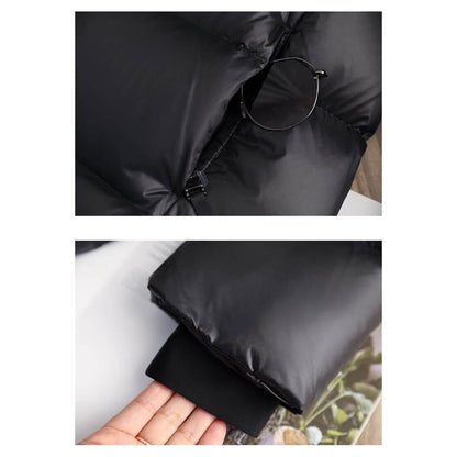 "Veste d'hiver femme en duvet, imperméable, coupe moderne, couleur neutre, idéale pour le froid avec capuche amovible."