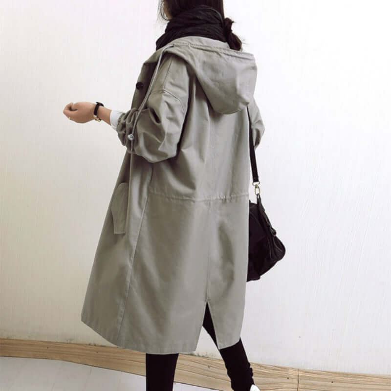 "Trench Saule pour femmes, imperméable chic, beige clair, coupe élégante, protection contre le vent, style intemporel."