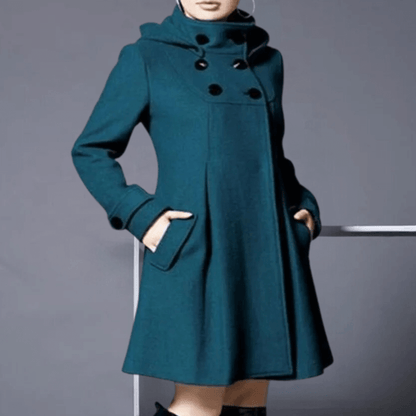 "Veste d'hiver femme élégante vert foncé avec poches latérales, coupe moderne, style sophistiqué pour occasions variées."