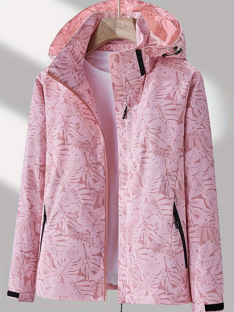 Veste imperméable femme, capuche ajustable, légère, moderne, coloris neutre, idéale pour activités extérieures et urbaines.